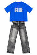 Blue Nike New York tee with dark wash baggy jeans